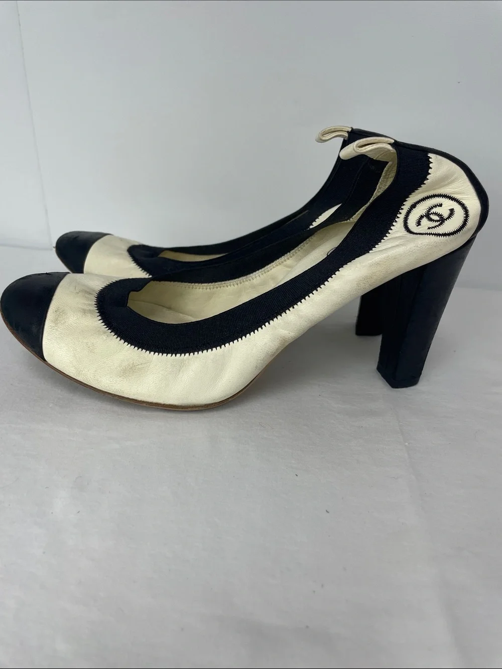 CHANEL Black & White Cap-Toe Leather Pumps